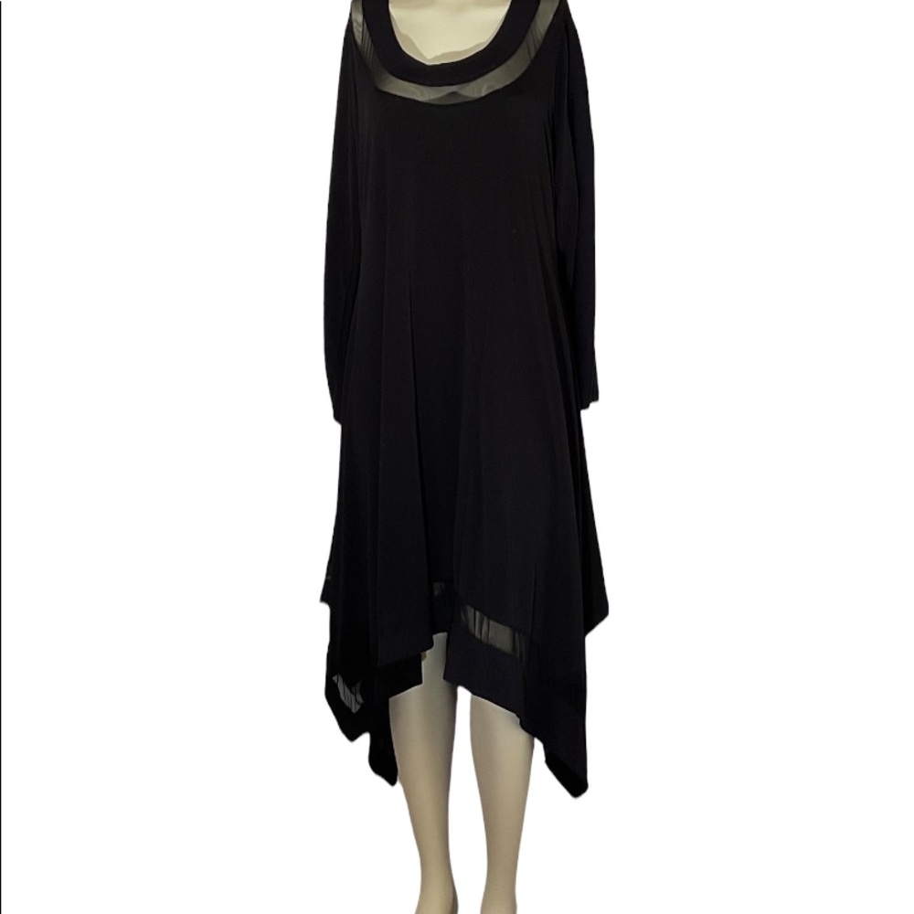 Dress by Mat. From Greece. Fits 12 to 16 thanks to its wide and flowing cut.